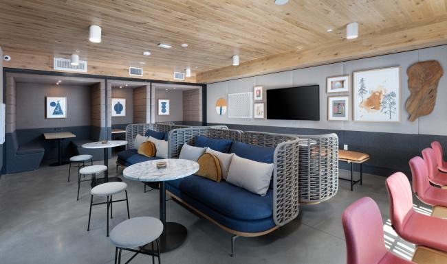 Settle into comfort at Star Harbor a room with a couch and chairs
