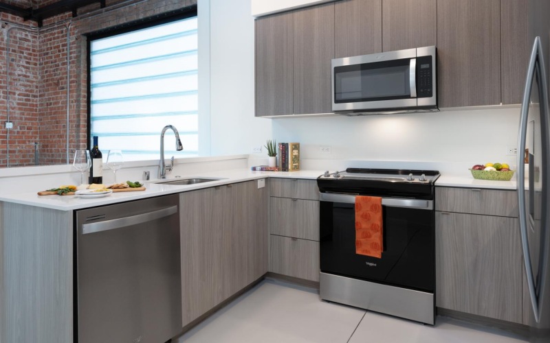 a kitchen with black appliances