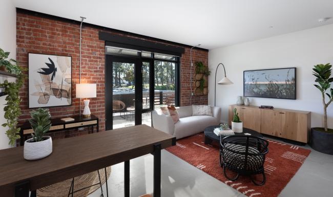 Settle into comfort at Star Harbor a living room with a table and chairs